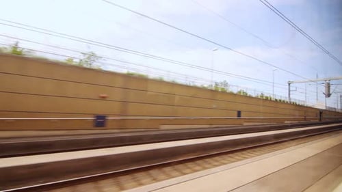 View From the Window Moving Train Along Railway Platform. Train Railroad. Country