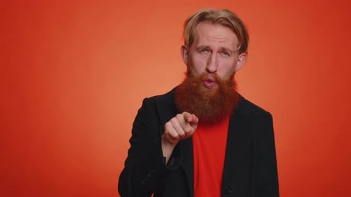 Man Pointing to Camera and Looking with Playful Happy Expression Making Choice of Lucky Winner