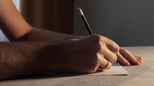 Writing with Pencil on Paper