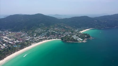 Aerial hyperlapse of the coast of Phuket island in Thailand. Flight over the beaches of Kata Noi, Ka