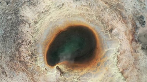 Top-down Shot Of A Boiling Geothermal Spring In Icelandic Highlands - Scenic View In Iceland - aeria