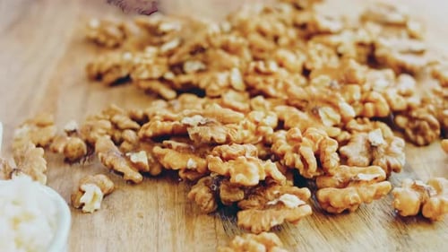 Shelled Walnuts on a Wooden Surface