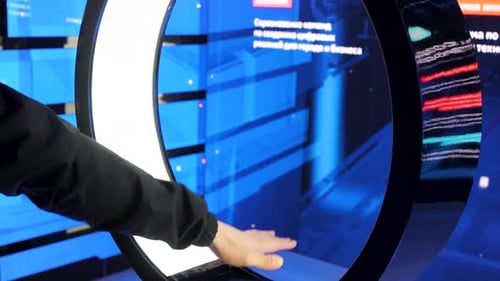 Hand Interacts with Interactive Touchscreen Display Technology
