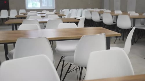 Smooth Wooden Tables Fill Extended Camp Dining Hall