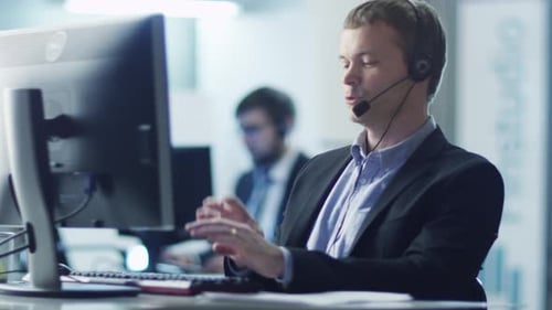 Customer Service Operator at Work in Call Center