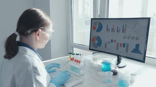 Scientist Analyzing Data at Bright Lab Workplace