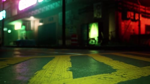 A Yellow Arrow Painted on the Ground in Front of a Building