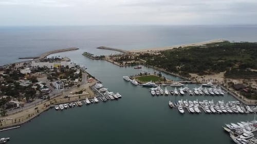 Puerto Los Cabos aerial footage of the marina near San Jose del Cabo in Los Cabos Mexico with yachts