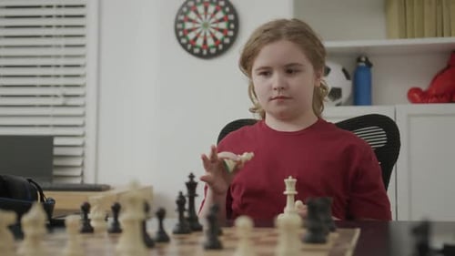 Kid Enjoying Quiet Chess Time at Home Child Developing Intelligence with Chess Play Kid