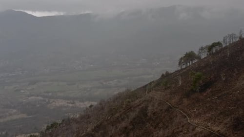Overcast Aerial View of a Mountain Landscape