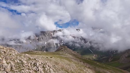 foggy snowy mountains