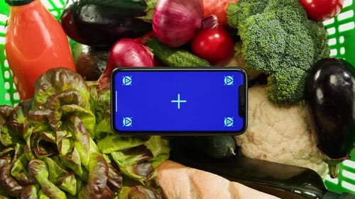 Food Shopping Delivery Online Shop Application Smartphone with Blue Chroma Key Screen and Fresh