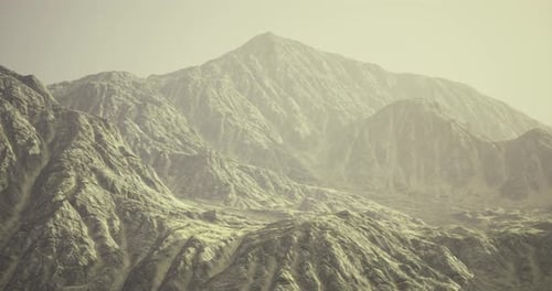Majestic Mountain Landscape Under Soft Light During Golden Hour