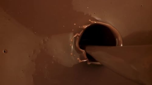 Super Slow Motion Splashes of Liquid Dark Chocolate Filmed on a Highspeed Camera at 1000 Fps