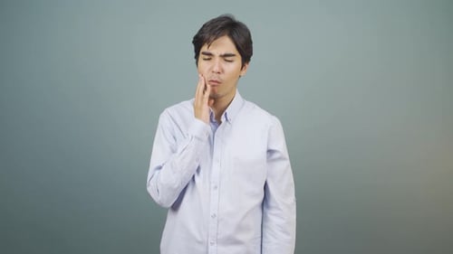 Man with toothache.