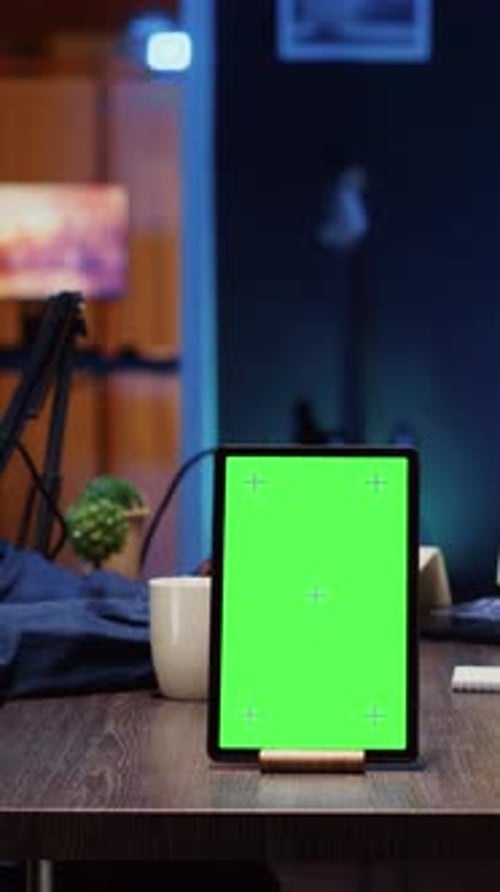 Vertical Video Green Screen Tablet in Front of Show Host Recording Podcast Enjoying Nice