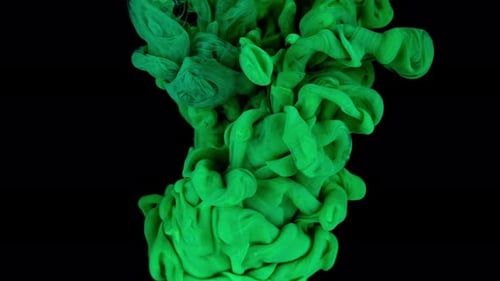 Yellow and Green Acrylic Paint Splash Each Other in Water Against a Grey Background Colored Ink