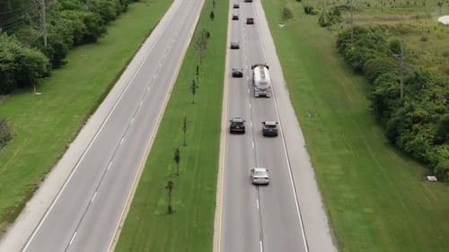 Aerial Shot of Cars and Trucks Driving on the Highway Slow Motion