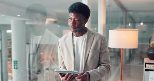 Thinking, tablet and black man by window in office for research, ideas or planning for creative