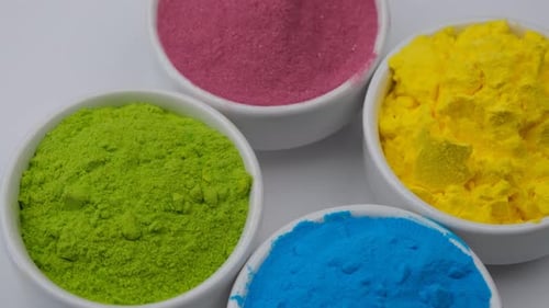 Bright Powder Piles in White Bowls
