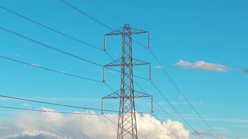Tall Steel Pylon Holding Several Stretched Conductors Flowing Electricity Connecting Regional Power