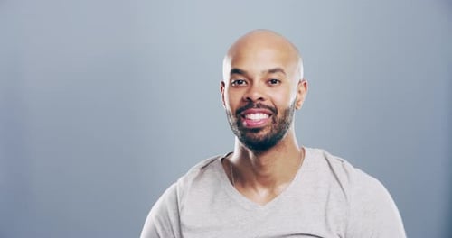 Bald Man Giving Thumbs Up Gesture