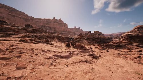 Flying Through a Rocky Desert Canyon Landscape