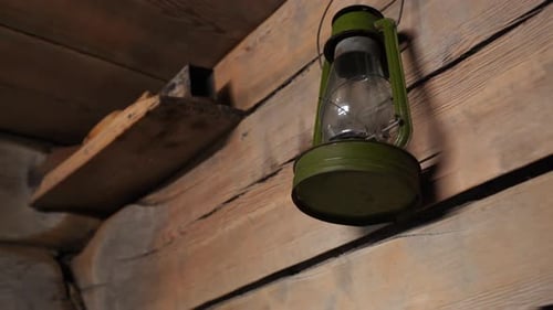 Vintage Lantern Hanging in Rustic Home Interior