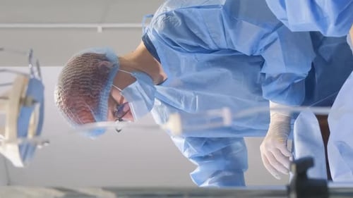Phlebectomy is Performed Under General or Spinal Anesthesia Surgeons Work in the Clinic Vertical