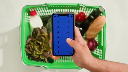 Food Shopping Delivery Online Shop Application Smartphone with Blue Chroma Key Screen and Fresh