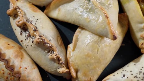 Golden Brown Baked Pastries with Seeds Close Up