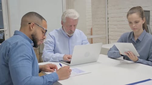 Busy Multiracial People Working in Office