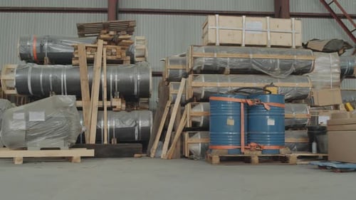 Warehouse Worker Moves Boxes With Pallet Jack
