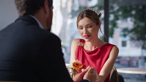 Romantic Spouses Enjoying Date in Restaurant Celebrating Anniversary Closeup