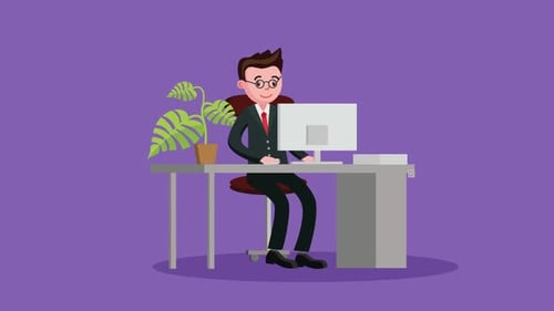 Male Office Worker With Glasses Working On Computer