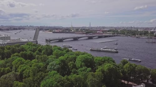 Saint-Petersburg, an aerial drone footage of an open bridge in Neva river, boats in a river, channel