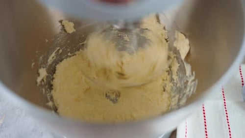 Electric Mixer Kneads Dough in the Kitchen