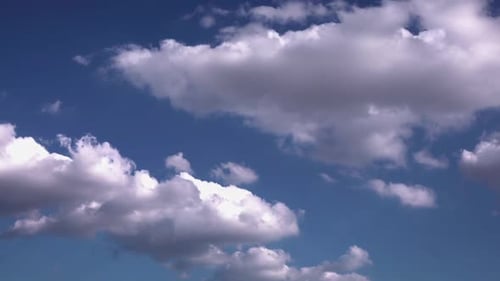Clouds On Blue Sky Background