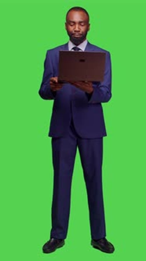 Vertical Video Front View of African American Man Attending Videocall Meeting on Pc