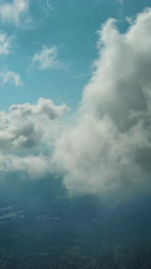 Clouds and mountains, flying in clouds