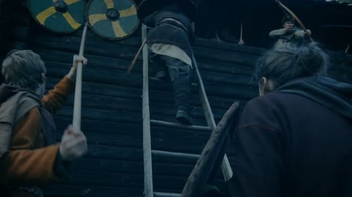 Large-Scale Medieval Battle Reenactment. Violent Tribe of Warriors Attack Wooden Fortress Wall, The