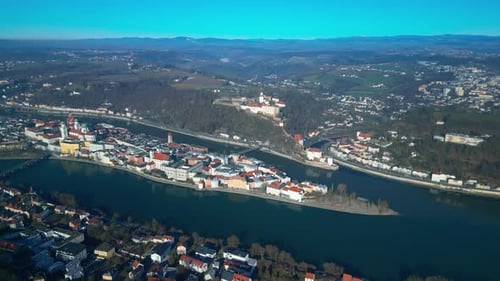 Picturesque European Town at River Confluence Aerial View