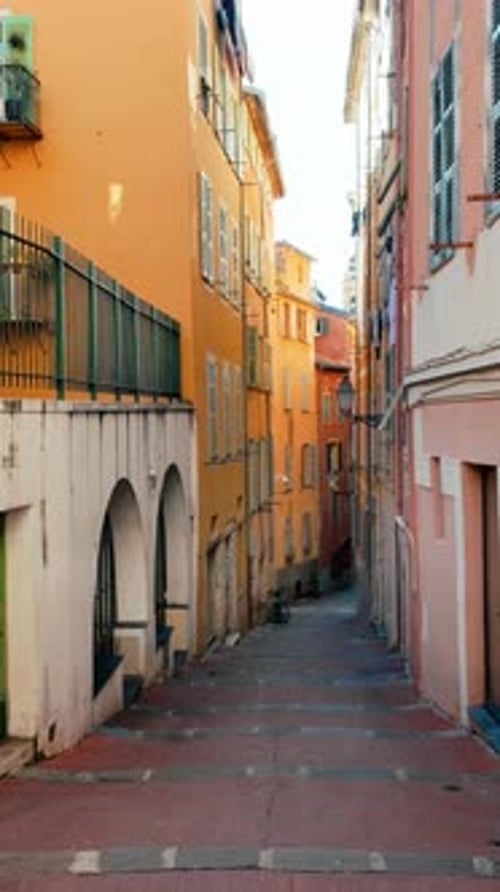Stairs on the streets of the Old Town of Nice, France in daylight. Vertical