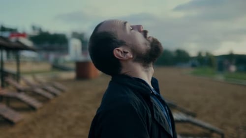 Devastated Man Throws Arm in Anger After Intense Emotional Blow