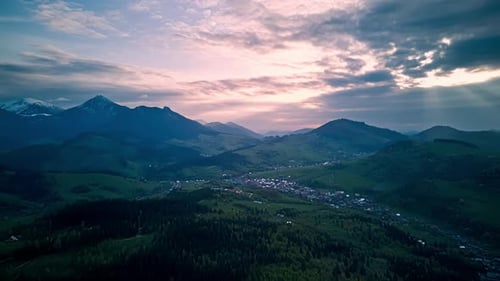 Aerial Hyperlapse Spring Mountainous Rural Landscape at Dusk