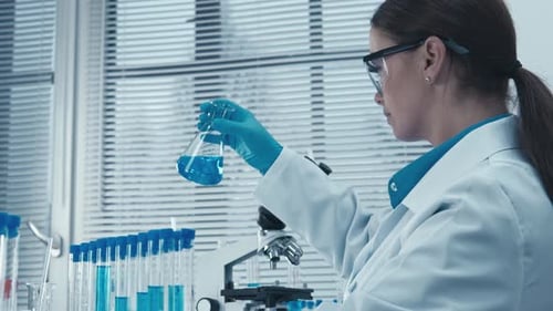 The Research Team in the Lab is Focused on Researching New Drugs and Treatments Researching the