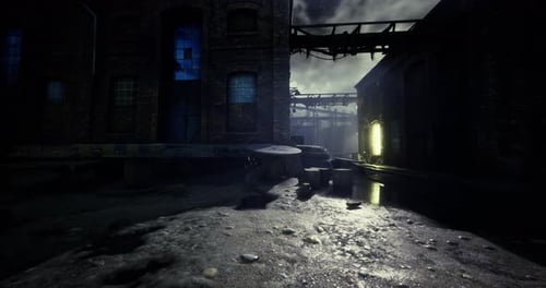 Abandoned Industrial Area Illuminated By Moonlight in a Nighttime Urban Setting