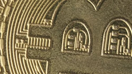 Extreme Close Up of a Golden Bitcoin