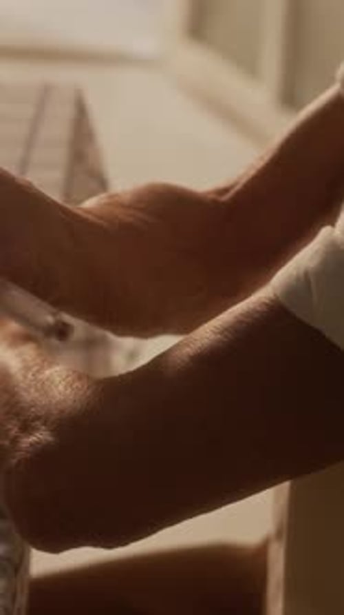 Close Up of Person Injecting Medicine into Arm