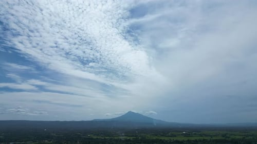 Time-Lapse of Fast-Moving Clouds Over a Tropical Mountain Landscape